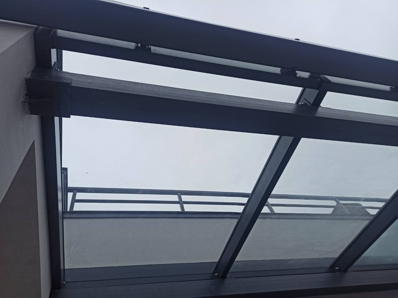 Installation of a glass roof and gutter on a terrace in a private house on Medova Pechera Street